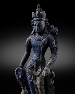 Lot 132 - A LAPIS LAZULI FIGURE OF PADMAPANI LOKESHVARA, TIBET, 12TH CENTURY