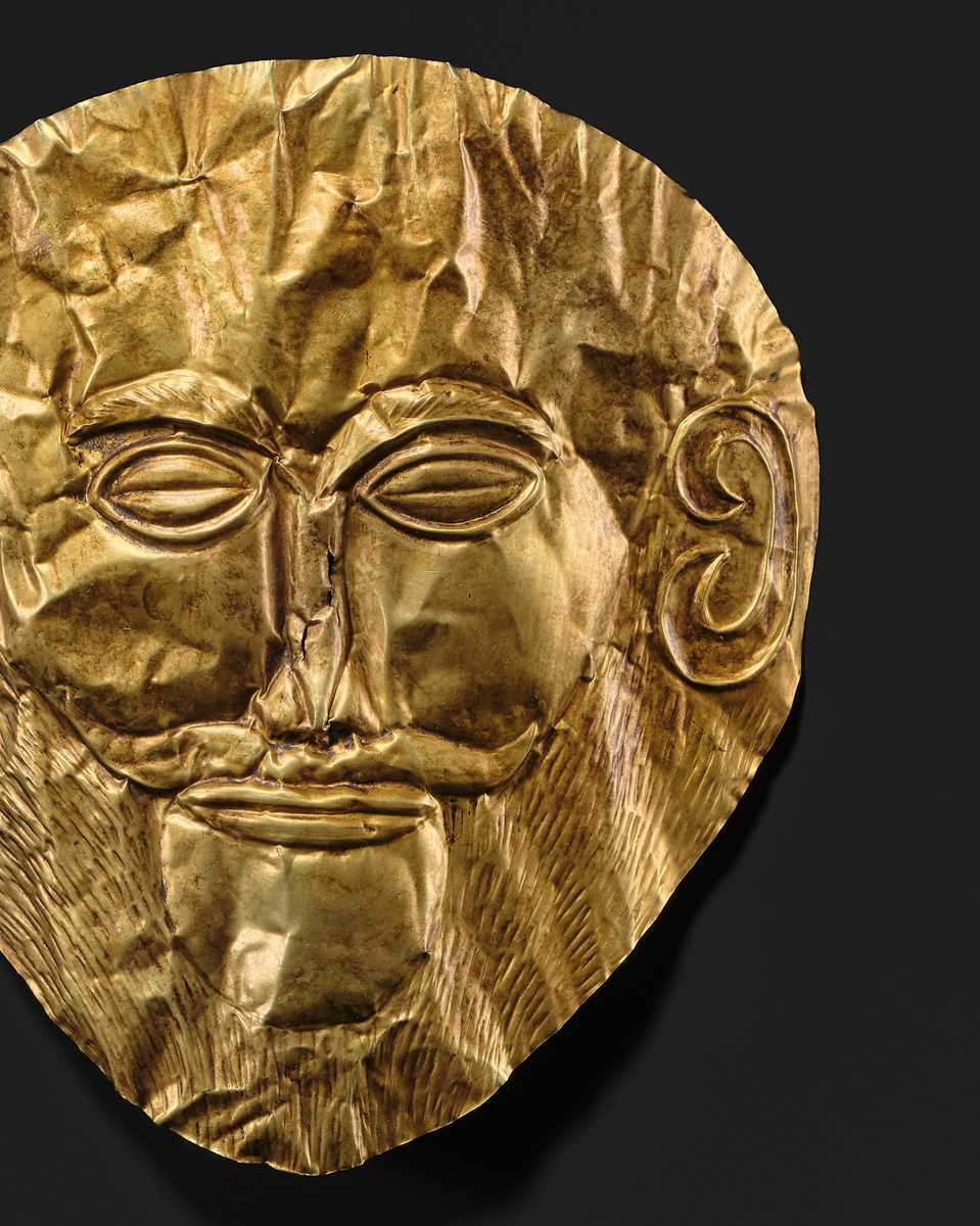 Lot 86 - AN EXPRESSIVE AND FINELY WORKED FUNERARY MASK OF A MAN, WESTERN ASIA, POSSIBLY 2ND–1ST MILLENNIUM BC