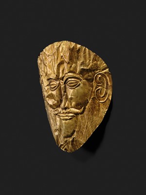 Lot 86 - AN EXPRESSIVE AND FINELY WORKED FUNERARY MASK OF A MAN, WESTERN ASIA, POSSIBLY 2ND–1ST MILLENNIUM BC