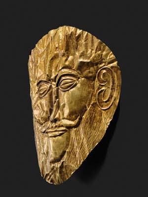 Lot 86 - AN EXPRESSIVE AND FINELY WORKED FUNERARY MASK OF A MAN, WESTERN ASIA, POSSIBLY 2ND–1ST MILLENNIUM BC