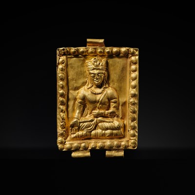 Lot 98 - A GOLD REPOUSSÉ ‘CROWNED BUDDHA’ PENDANT, ANCIENT REGION OF GANDHARA