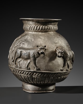 Lot 317 - A FINE SILVER REPOUSSE ‘HERD OF LIONS’ JAR, SASANIAN DYNASTY