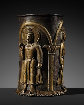 Lot 436 - A PARCEL-GILT BUDDHIST GOBLET, COPPER ALLOY REPOUSSÉ