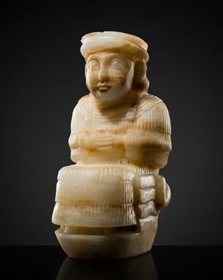 Lot 316 - AN ALABASTER FIGURE OF THE HIGH PRIESTESS ENHEDUANNA, NEO-SUMERIAN UR III DYNASTY STYLE