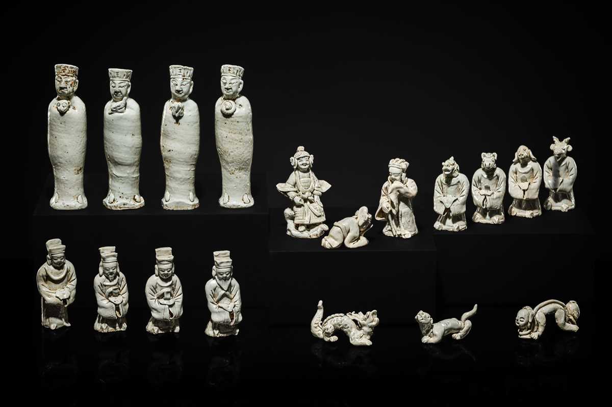 Lot 34 - A FINE COLLECTION OF EIGHTEEN QINGBAI FIGURES, SONG DYNASTY