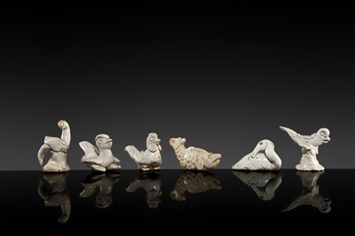 Lot 144 - A GROUP OF SIX MINIATURE QINGBAI FIGURES OF ANIMALS, SONG DYNASTY