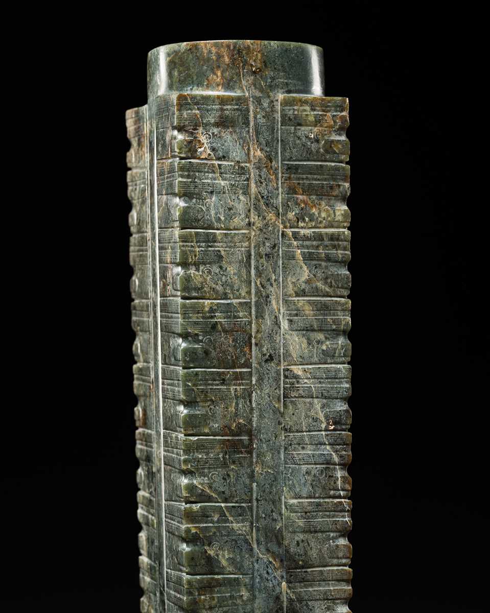 Lot 60 - AN EXCEEDINGLY RARE AND VERY LARGE THIRTEEN-TIERED GREEN JADE CONG, NEOLITHIC PERIOD, LIANGZHU CULTURE