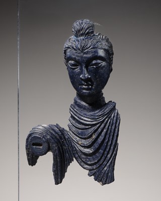 Lot 102 - A FINE LAPIS LAZULI FRAGMENT OF BUDDHA SHAKYAMUNI