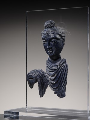 Lot 102 - A FINE LAPIS LAZULI FRAGMENT OF BUDDHA SHAKYAMUNI