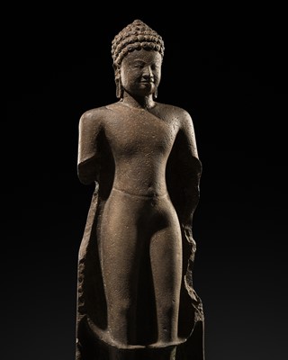 Lot 396 - A SANDSTONE FIGURE OF BUDDHA SHAKYAMUNI, ANGKOR BOREI STYLE, PRE-ANGKOR PERIOD
