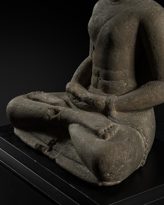 Lot 654 - A SMALL ANDESITE TORSO OF BUDDHA AMITABHA, CENTRAL JAVANESE PERIOD, SHAILENDRA DYNASTY