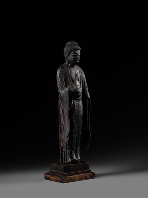 AN EARLY CARVED CYPRESS WOOD FIGURE OF AMIDA NYORAI, HEIAN PERIOD