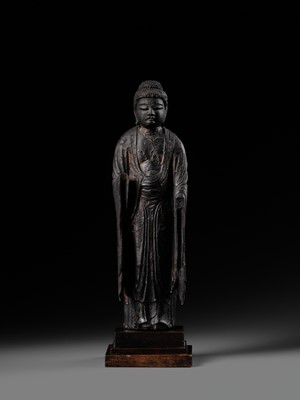 AN EARLY CARVED CYPRESS WOOD FIGURE OF AMIDA NYORAI, HEIAN PERIOD
