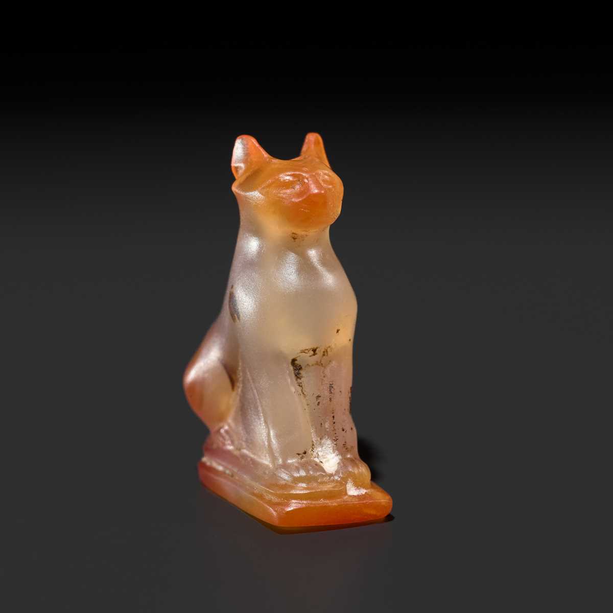 Lot 38 - A CARNELIAN ‘CAT’ AMULET, BASTET, LATE PERIOD TO PTOLEMAIC ERA