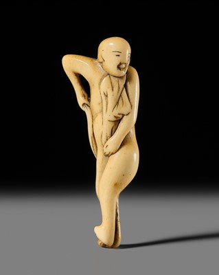 Lot 308 - TSUNEMASA: A RARE ANTLER NETSUKE OF A NAKED MAN TYING HIS FUNDOSHI