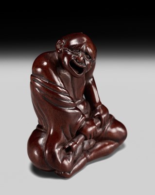 Lot 239 - MIWA: AN UNUSUAL WOOD NETSUKE OF A GRIMACING TOOTHLESS MAN