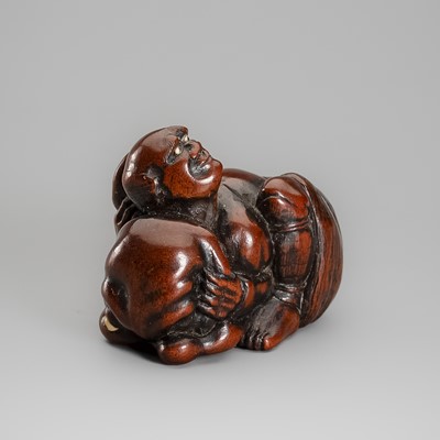MASAYUKI: A FINE INLAID WOOD NETSUKE OF ARIOMARU STRUGGLING WITH AN OCTOPUS