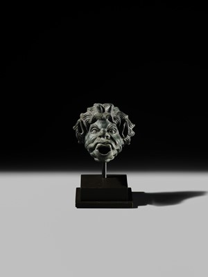 Lot 77 - A ROMAN BRONZE WATER SPOUT DEPICTING PAN, PROBABLY FROM A NYMPHAEUM, CIRCA 1ST–2ND CENTURY