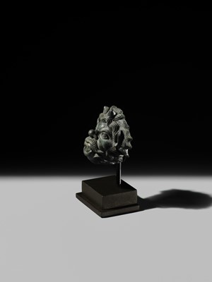 Lot 77 - A ROMAN BRONZE WATER SPOUT DEPICTING PAN, PROBABLY FROM A NYMPHAEUM, CIRCA 1ST–2ND CENTURY