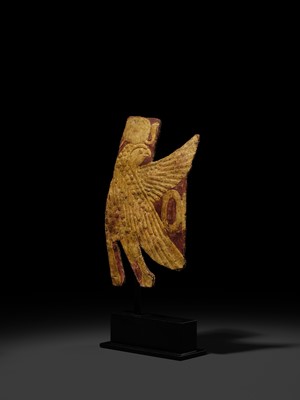 Lot 17 - A GILT MUMMY CASING FRAGMENT DEPICTING A FALCON, LATE PERIOD-PTOLEMAIC ERA