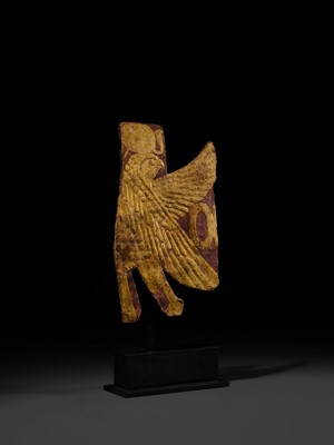 Lot 17 - A GILT MUMMY CASING FRAGMENT DEPICTING A FALCON, LATE PERIOD-PTOLEMAIC ERA