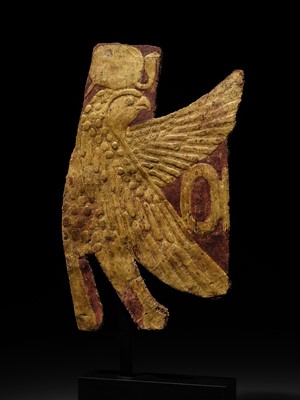 Lot 17 - A GILT MUMMY CASING FRAGMENT DEPICTING A FALCON, LATE PERIOD-PTOLEMAIC ERA