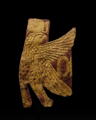 Lot 17 - A GILT MUMMY CASING FRAGMENT DEPICTING A FALCON, LATE PERIOD-PTOLEMAIC ERA