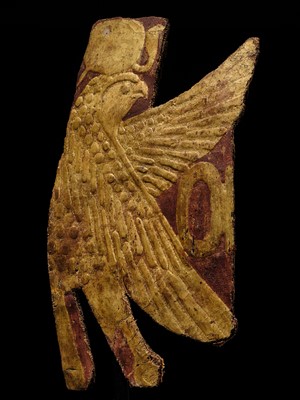 Lot 17 - A GILT MUMMY CASING FRAGMENT DEPICTING A FALCON, LATE PERIOD-PTOLEMAIC ERA