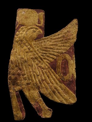 Lot 17 - A GILT MUMMY CASING FRAGMENT DEPICTING A FALCON, LATE PERIOD-PTOLEMAIC ERA