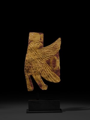 Lot 17 - A GILT MUMMY CASING FRAGMENT DEPICTING A FALCON, LATE PERIOD-PTOLEMAIC ERA