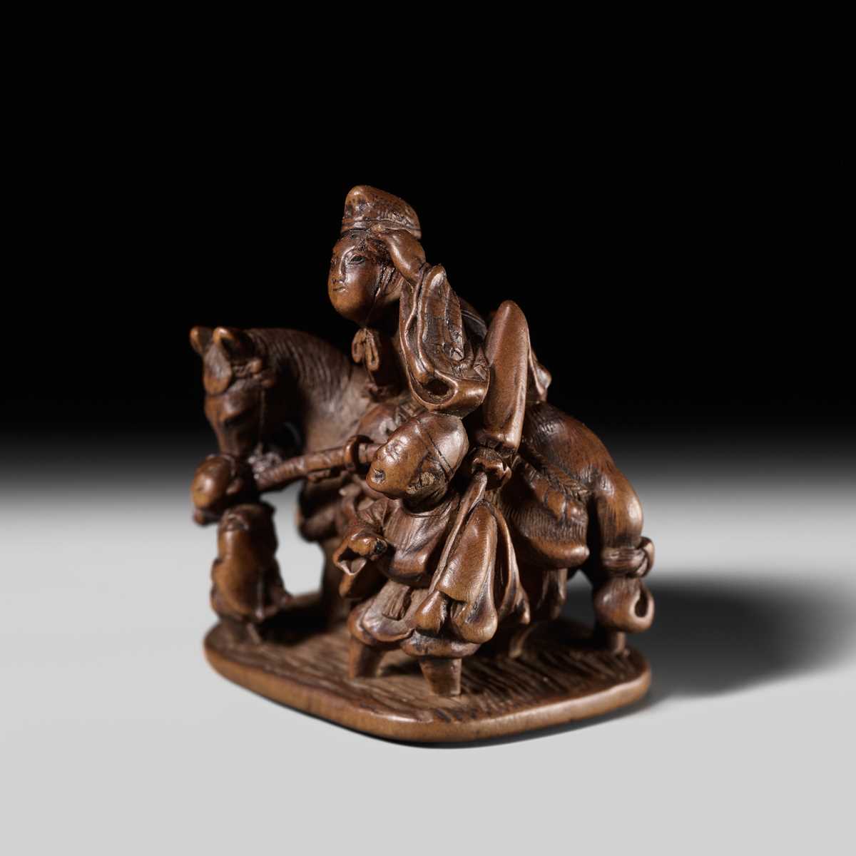 Lot 252 - HO RAKUMIN: A FINE WOOD NETSUKE OF ARIWARA