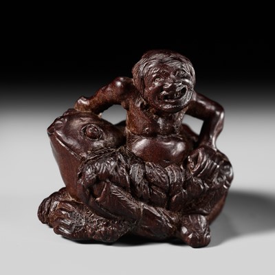 Lot 234 - MIWA: A GOOD WOOD NETSUKE OF GAMA SENNIN WITH A HUGE THREE-LEGGED TOAD