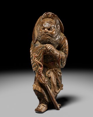 Lot 90 - A POWERFUL SAISHIKI NETSUKE OF SHOKI, ATTRIBUTED YOSHIMURA SHUZAN