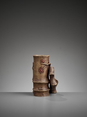 Lot 330 - A YIXING ‘BAMBOO AND PLUM BLOSSOM’ BRUSH HOLDER, QING