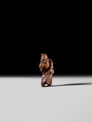 Lot 282 - GYOKUSO: A SUPERB SO SCHOOL INLAID WOOD NETSUKE OF A NOH ACTOR WEARING AN OKAME MASK