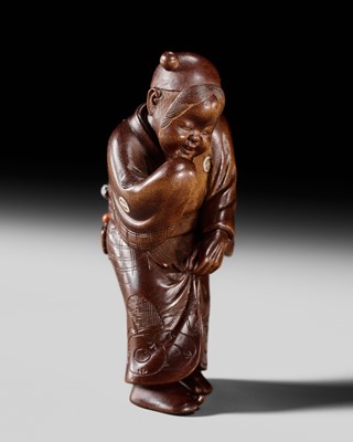 Lot 282 - GYOKUSO: A SUPERB SO SCHOOL INLAID WOOD NETSUKE OF A NOH ACTOR WEARING AN OKAME MASK