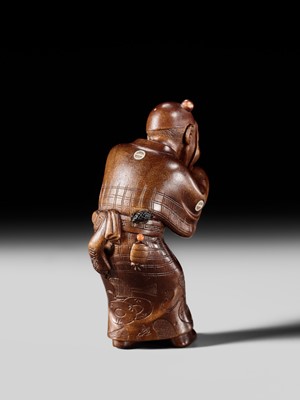Lot 282 - GYOKUSO: A SUPERB SO SCHOOL INLAID WOOD NETSUKE OF A NOH ACTOR WEARING AN OKAME MASK