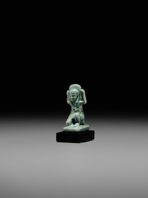 A GREEN FAIENCE AMULET OF SHU, THE GOD OF AIR AND ATMOSPHERE, LATE PERIOD, DYNASTY XXVI