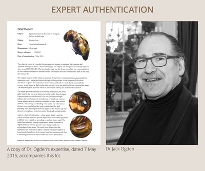 Lot 82 - AN AGATE AMULET IN THE FORM OF A LION-HEADED EAGLE, IMDUGUD, WESTERN ASIA, CIRCA THIRD MILLENNIUM BC