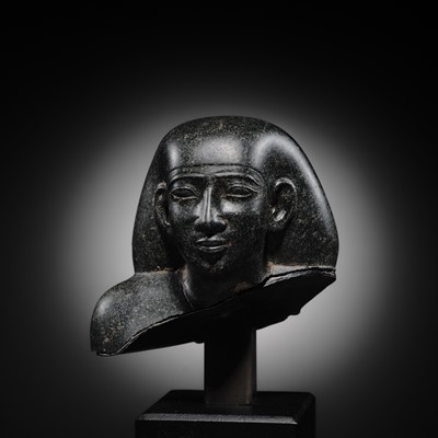 Lot 9 - AN INSCRIBED DIORITE BUST OF A ‘SOLE COMPANION’, SAITE PERIOD, DYNASTY XXVI