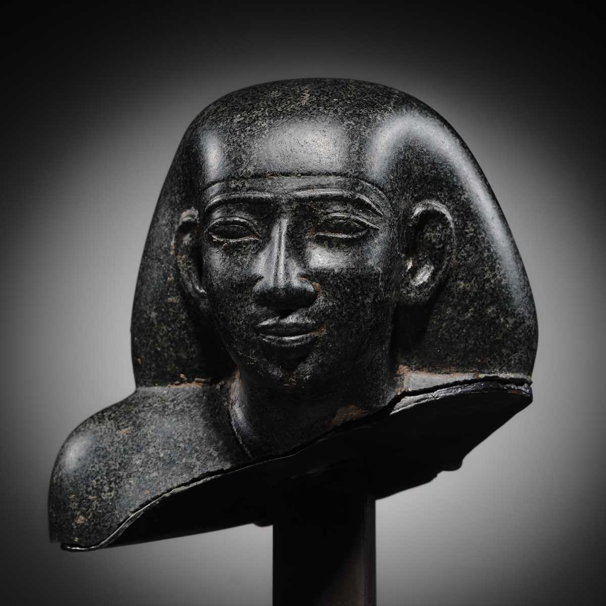 Lot 9 - AN INSCRIBED DIORITE BUST OF A ‘SOLE COMPANION’, SAITE PERIOD, DYNASTY XXVI