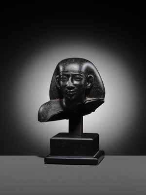 Lot 9 - AN INSCRIBED DIORITE BUST OF A ‘SOLE COMPANION’, SAITE PERIOD, DYNASTY XXVI