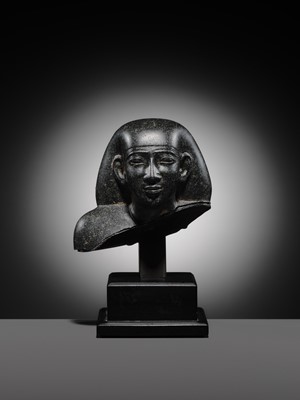 Lot 9 - AN INSCRIBED DIORITE BUST OF A ‘SOLE COMPANION’, SAITE PERIOD, DYNASTY XXVI