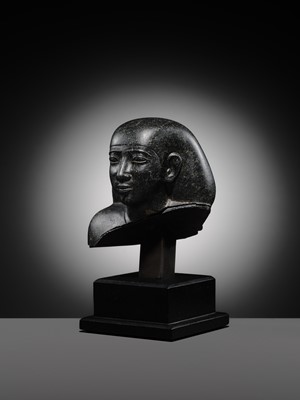 Lot 9 - AN INSCRIBED DIORITE BUST OF A ‘SOLE COMPANION’, SAITE PERIOD, DYNASTY XXVI
