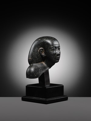Lot 9 - AN INSCRIBED DIORITE BUST OF A ‘SOLE COMPANION’, SAITE PERIOD, DYNASTY XXVI