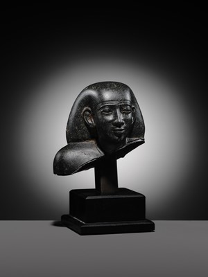 Lot 9 - AN INSCRIBED DIORITE BUST OF A ‘SOLE COMPANION’, SAITE PERIOD, DYNASTY XXVI