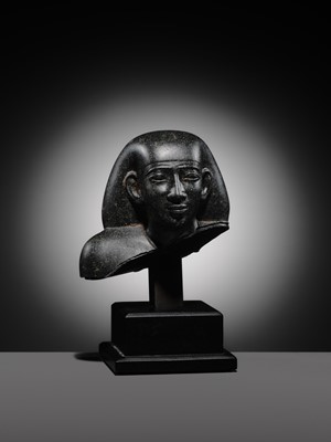Lot 9 - AN INSCRIBED DIORITE BUST OF A ‘SOLE COMPANION’, SAITE PERIOD, DYNASTY XXVI