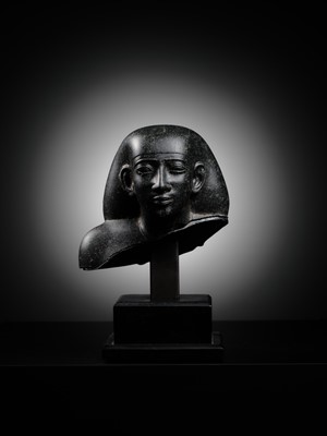 Lot 9 - AN INSCRIBED DIORITE BUST OF A ‘SOLE COMPANION’, SAITE PERIOD, DYNASTY XXVI