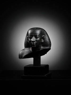 Lot 9 - AN INSCRIBED DIORITE BUST OF A ‘SOLE COMPANION’, SAITE PERIOD, DYNASTY XXVI