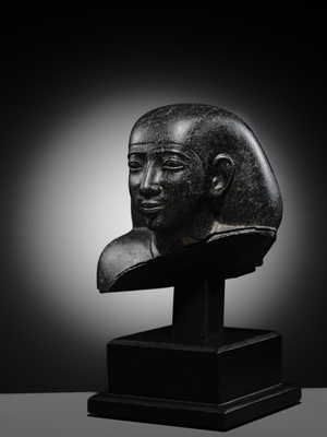 Lot 9 - AN INSCRIBED DIORITE BUST OF A ‘SOLE COMPANION’, SAITE PERIOD, DYNASTY XXVI